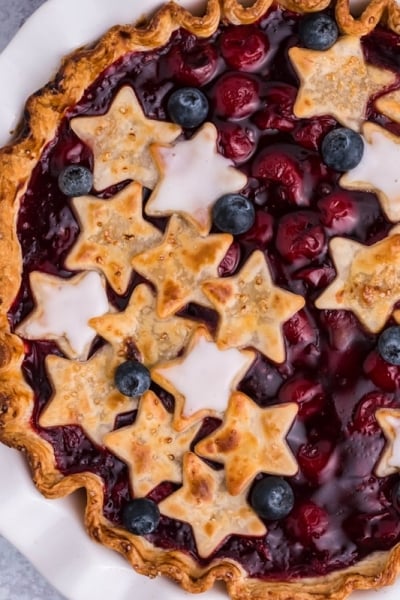 overhead of cherry pie with stars
