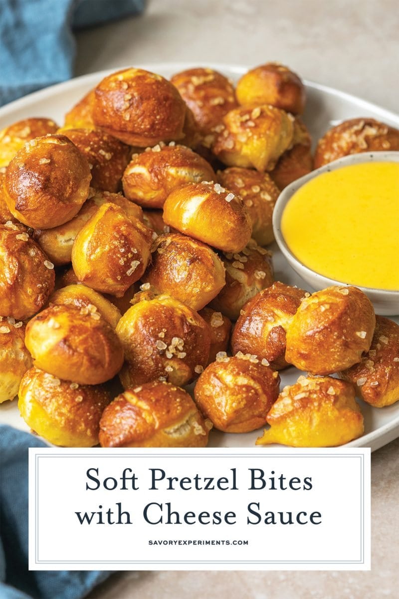 close up of soft pretzel bites with dipping sauce 