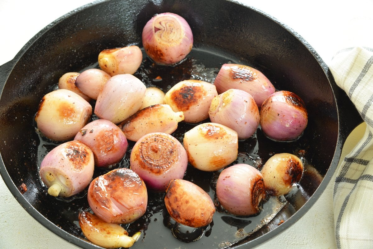 caramelized shallots in a cast iron skillet 