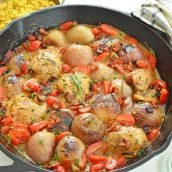 braised chicken thighs in a cast iron skillet