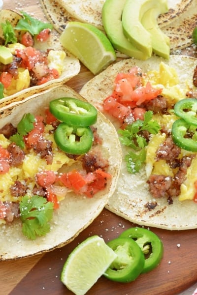 Homemade breakfast tacos on a cutting board