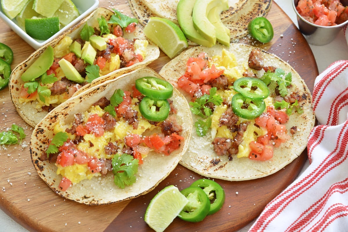 Homemade breakfast tacos on a cutting board