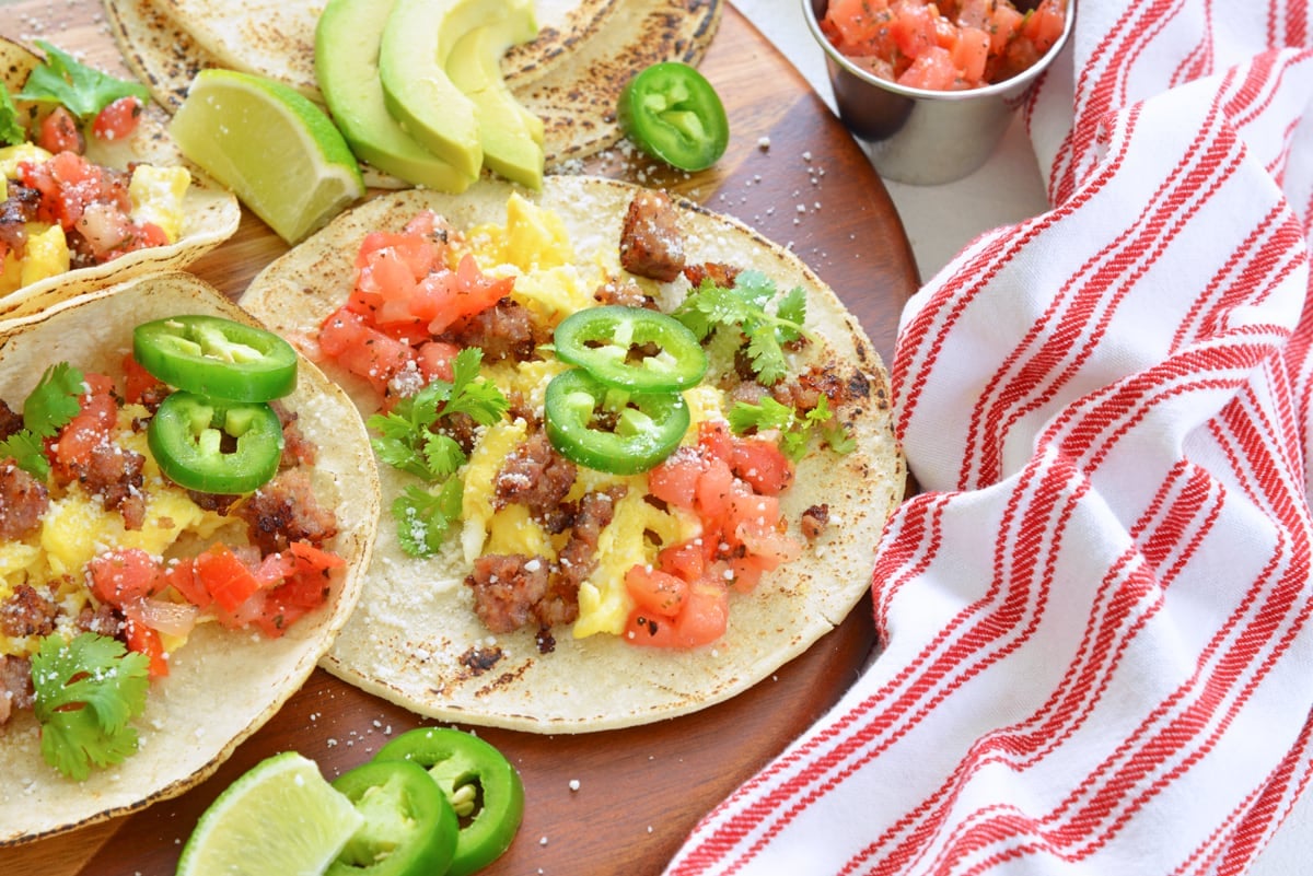 angle view of corn tortilla with eggs, sausage, pico and jalapeno