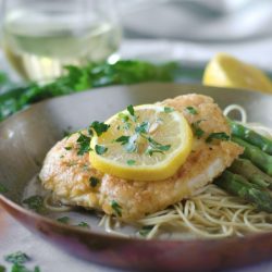 angled shot of plate of chicken francese
