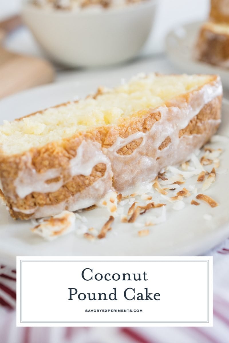 close up of slice of cake with glaze and coconut flakes 