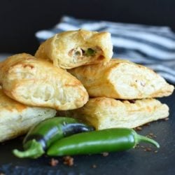 jalapeno popper turnovers on a tray
