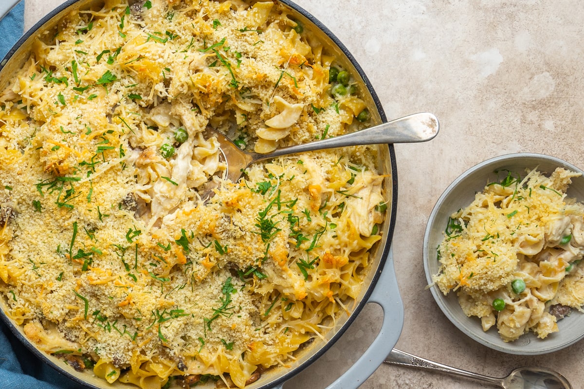 cheesy chicken casserole being served 