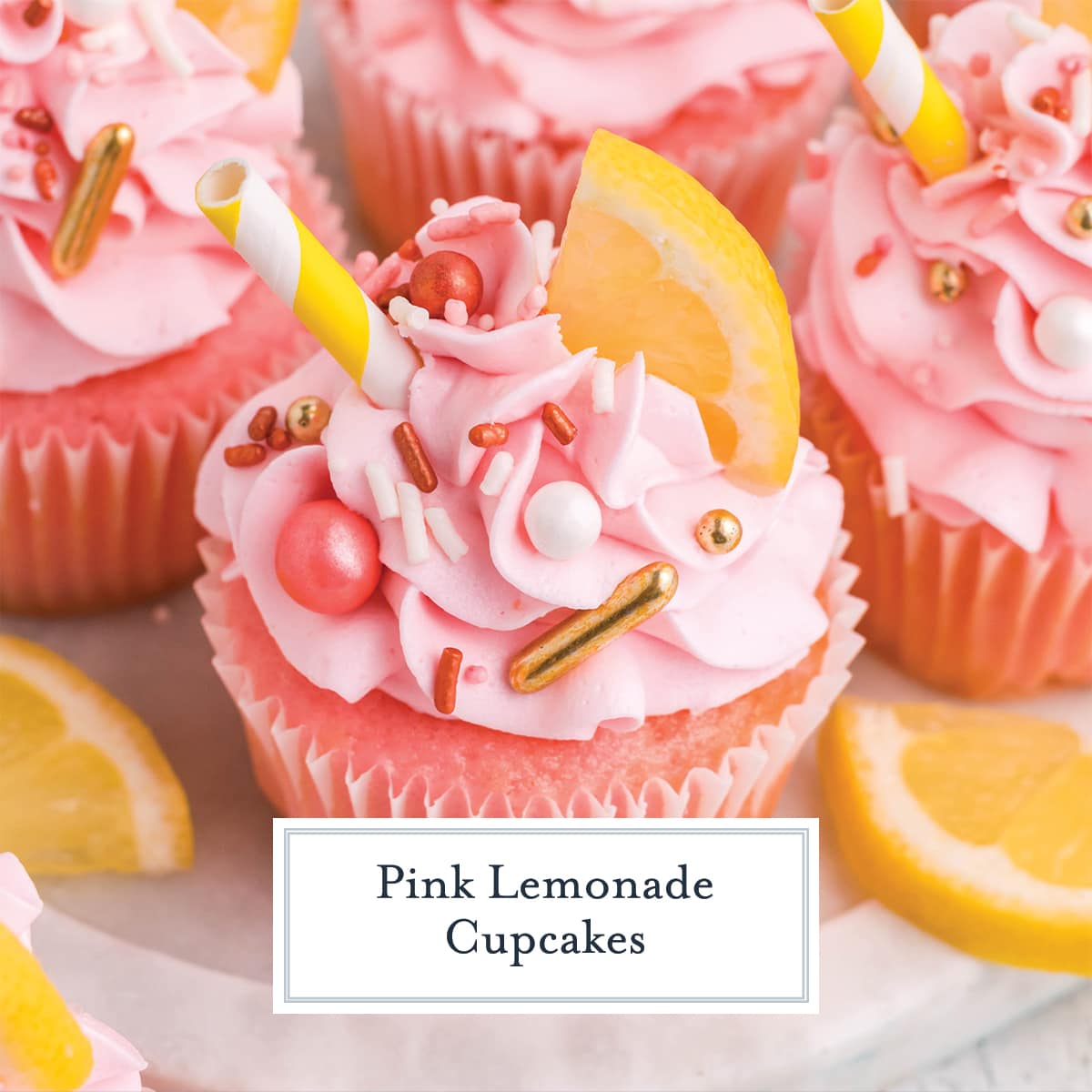 close up of ribboned pink frosting with lemons and sprinkles 