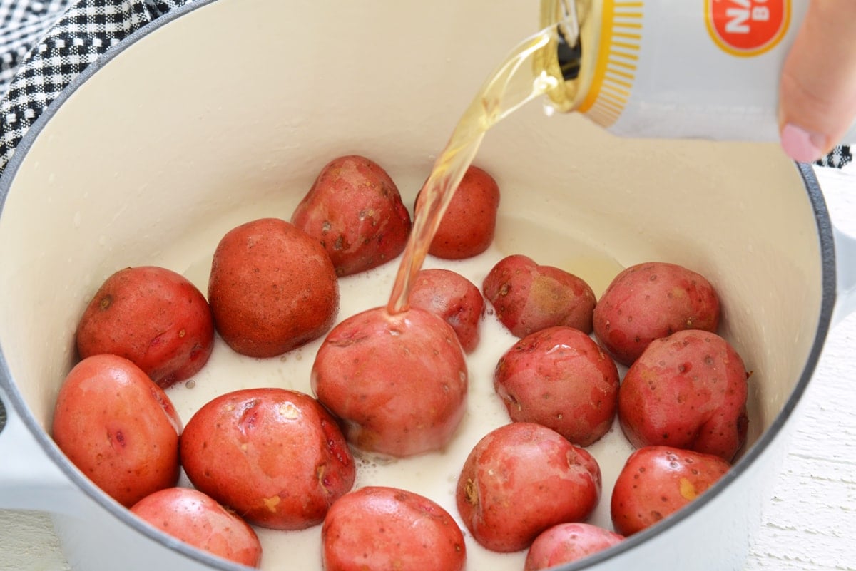 beer pouring onto potatoes 