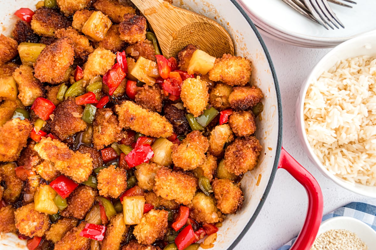 crunchy chicken in sweet and sour sauce in a skillet