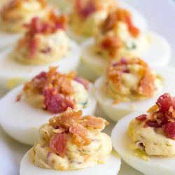 bacon jalapeno deviled eggs on a plate