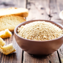 wooden bowl of homemade bread crumbs