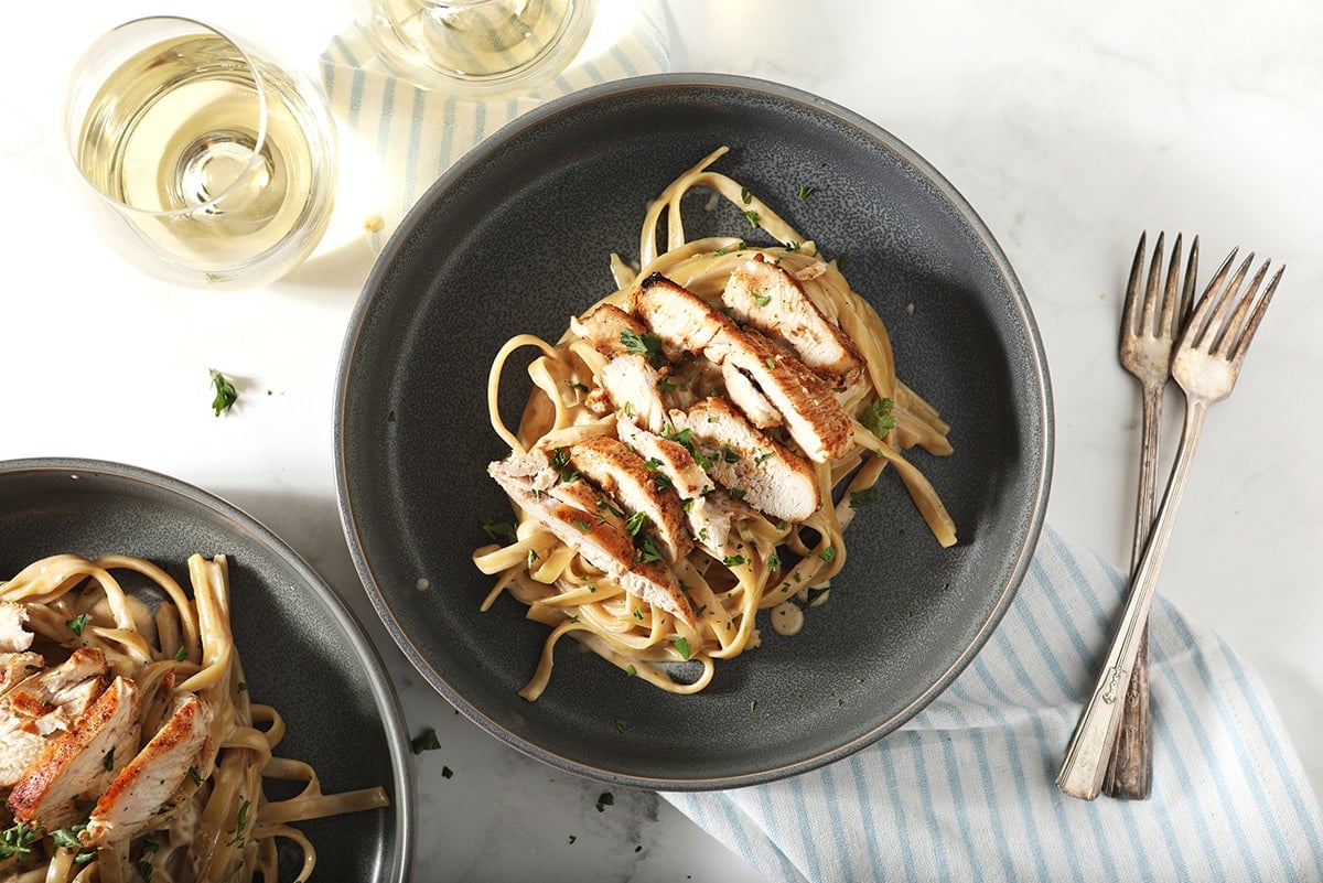 serving cajun chicken alfredo  