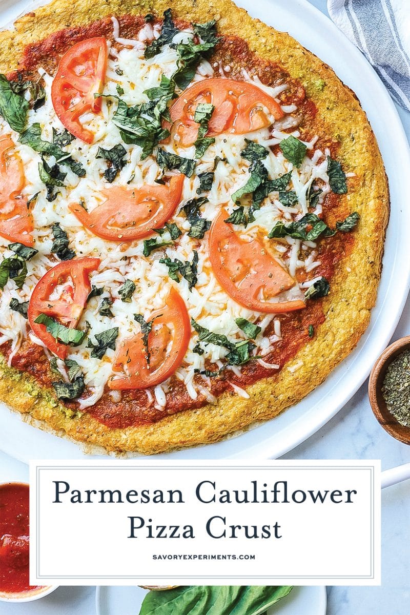 close up of parmesan cauliflower pizza with caprese toppings
