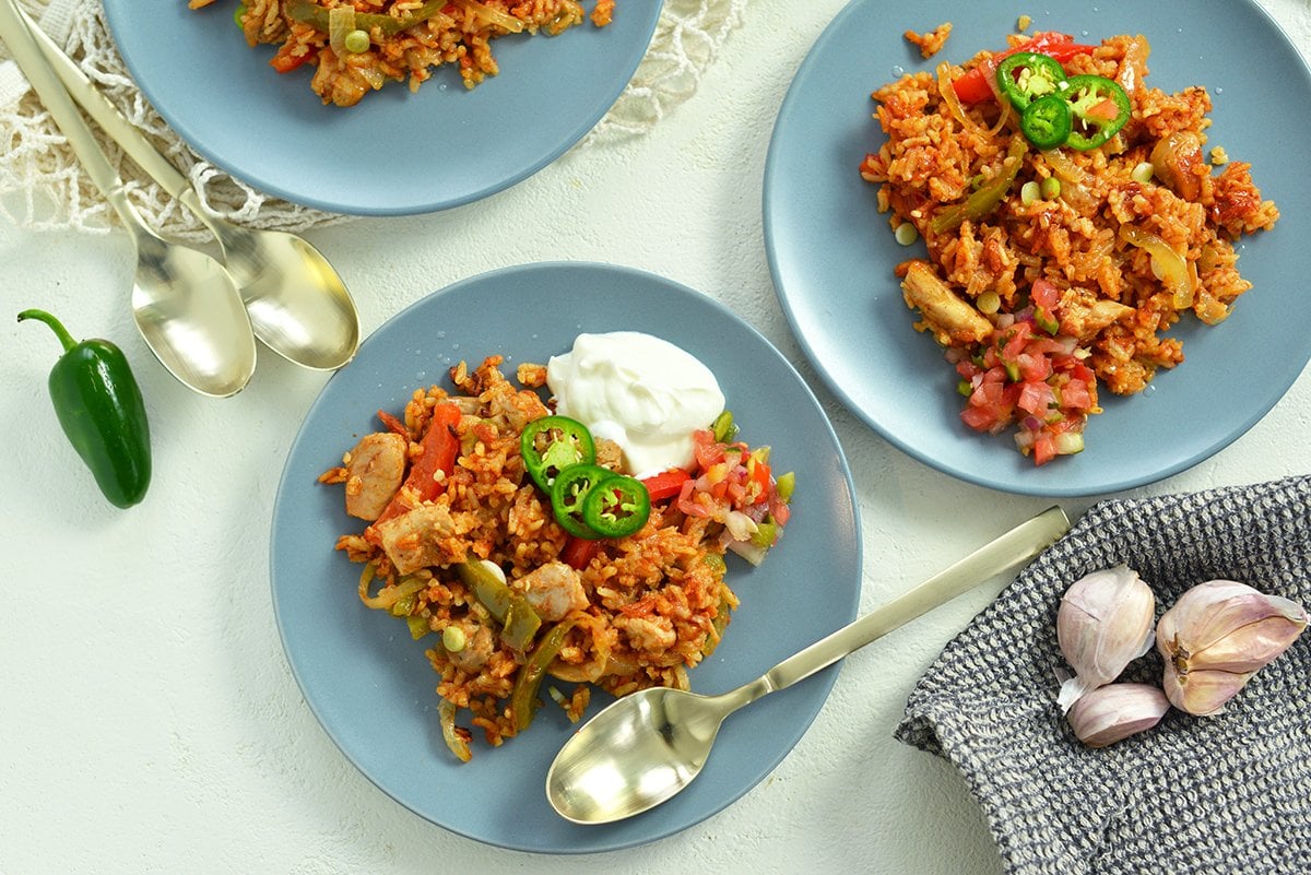 chicken and rice on blue serving plates 