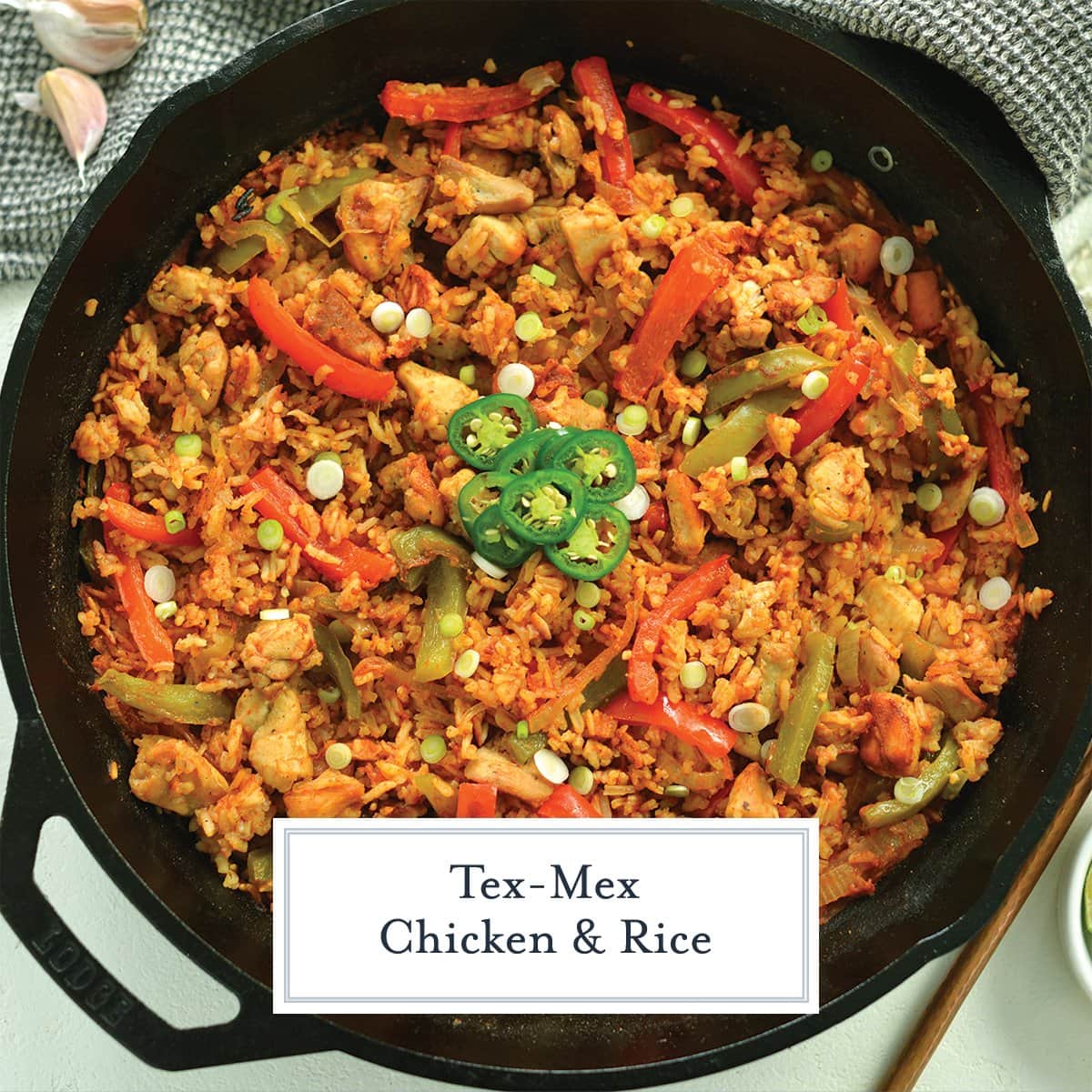 overhead of chicken and rice skillet with jalapeno slices 