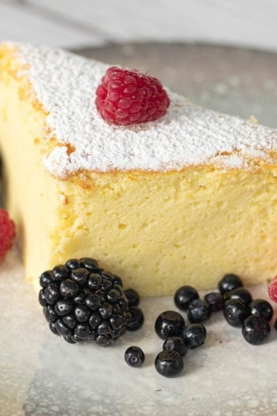 slice of japanese cheesecake with fresh berries