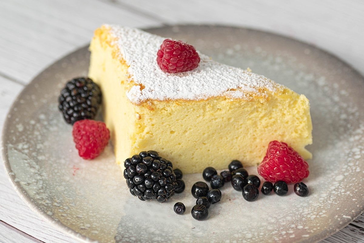 slice of japanese cheesecake with fresh berries