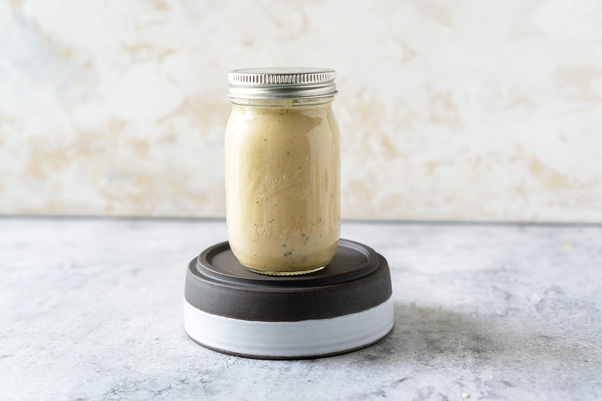 jar of remoulade sauce on coasters