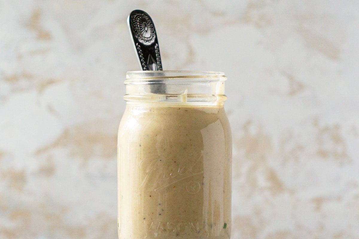 close up of mason jar with remoulade sauce 