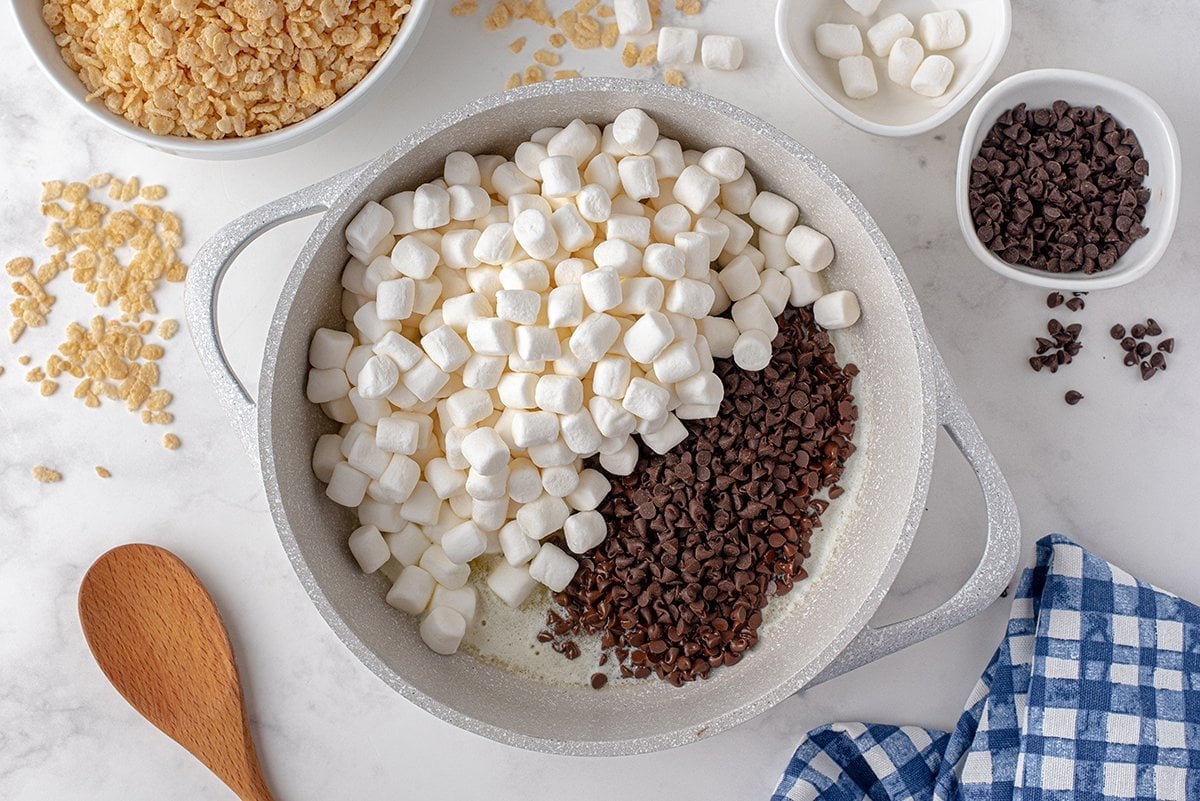 overhead shot of marshmallows and chocolate in pan