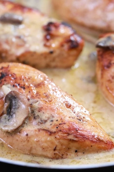 chicken marsala with mushrooms in a skillet