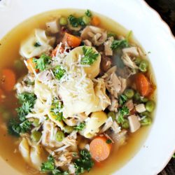 overhead shot of bowl of chicken tortellini soup