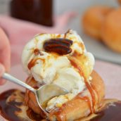 spoon digging into an ice cream sundae