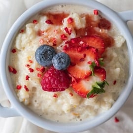 close up of rice pudding with fresh fruit