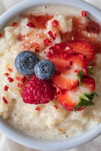 close up of rice pudding with fresh fruit