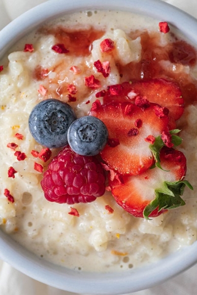 close up of rice pudding with fresh fruit