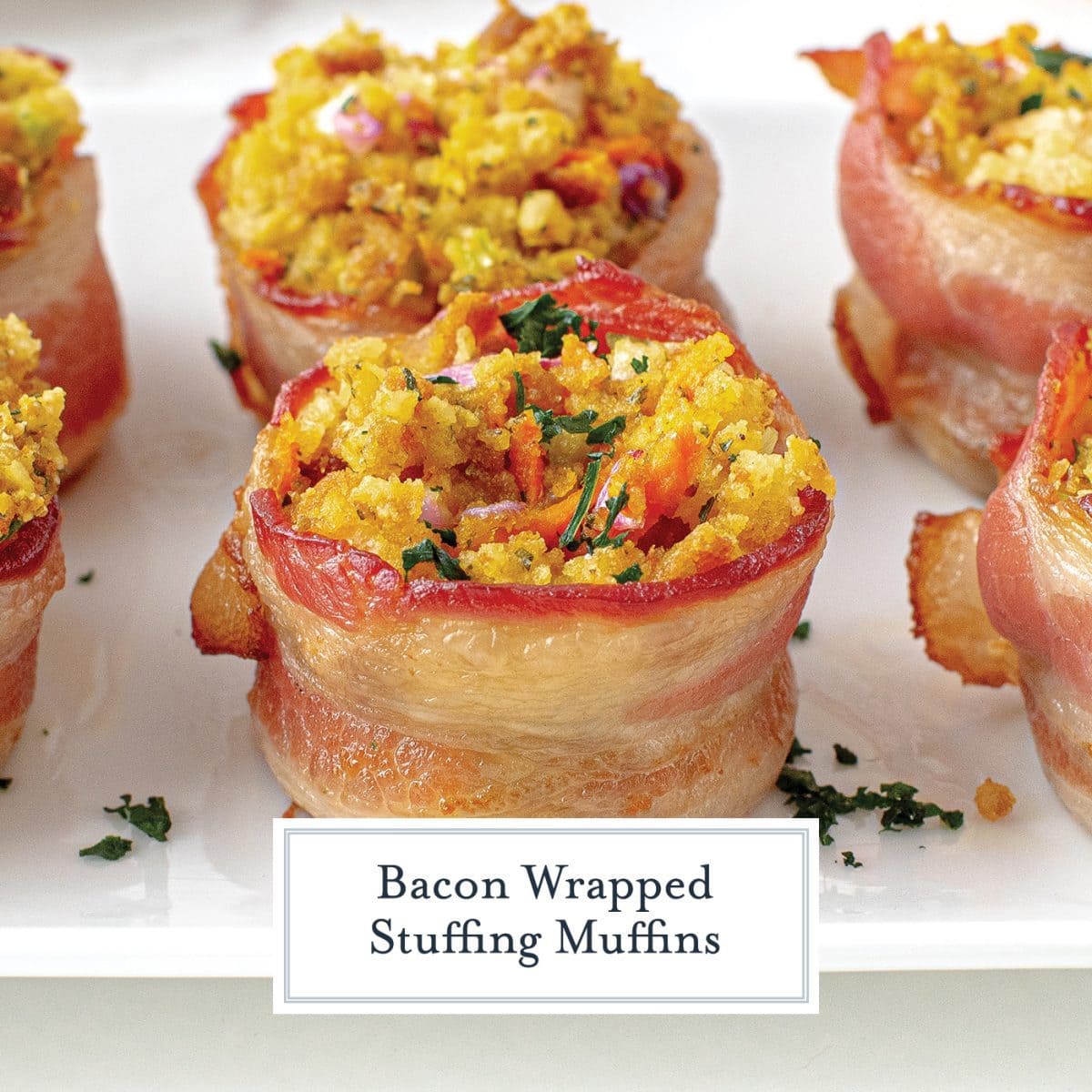 close up of stuffing muffins wrapped with bacon 
