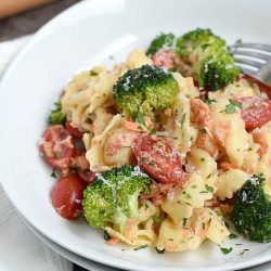 salmon tortellini pasta on a plate