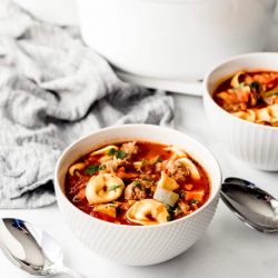 two bowls of tomato tortellini soup