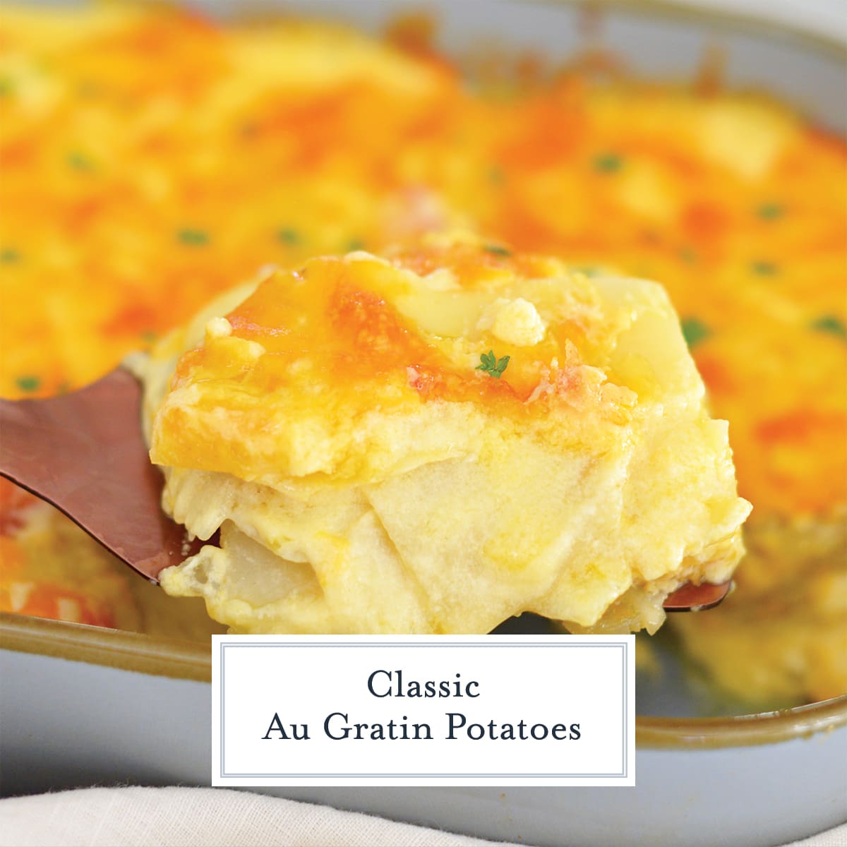 close up of cheesy potatoes on a spatula 
