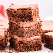 stack of frosted brownies