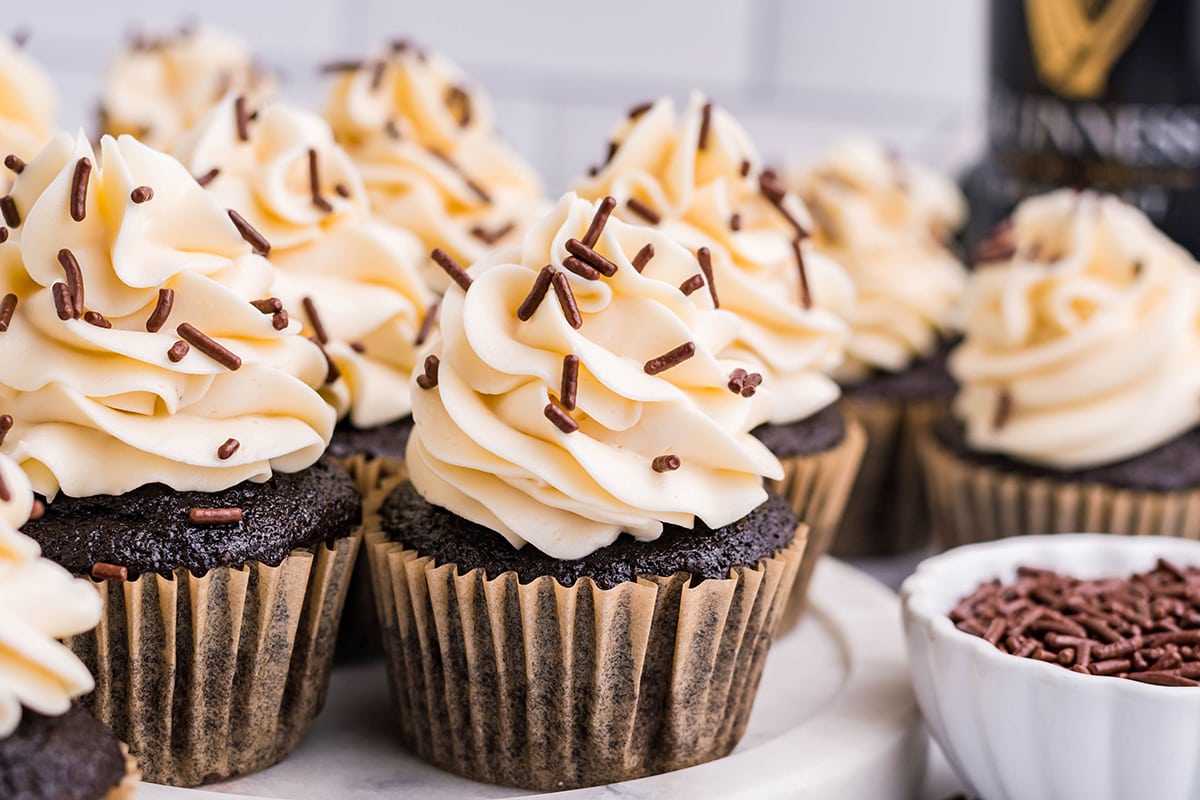 angle view of frosted cupcakes with chocolate sprinkles  