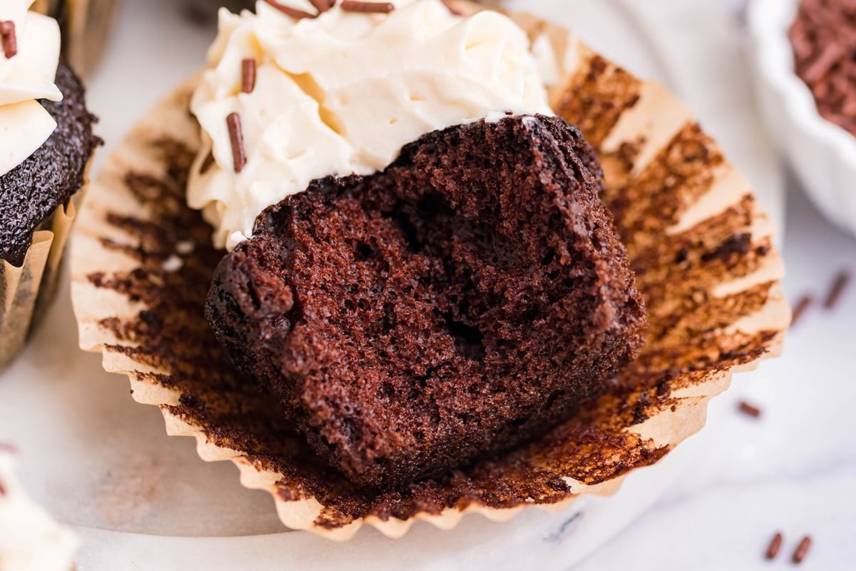 chocolate cupcake cut in half with sprinkles  