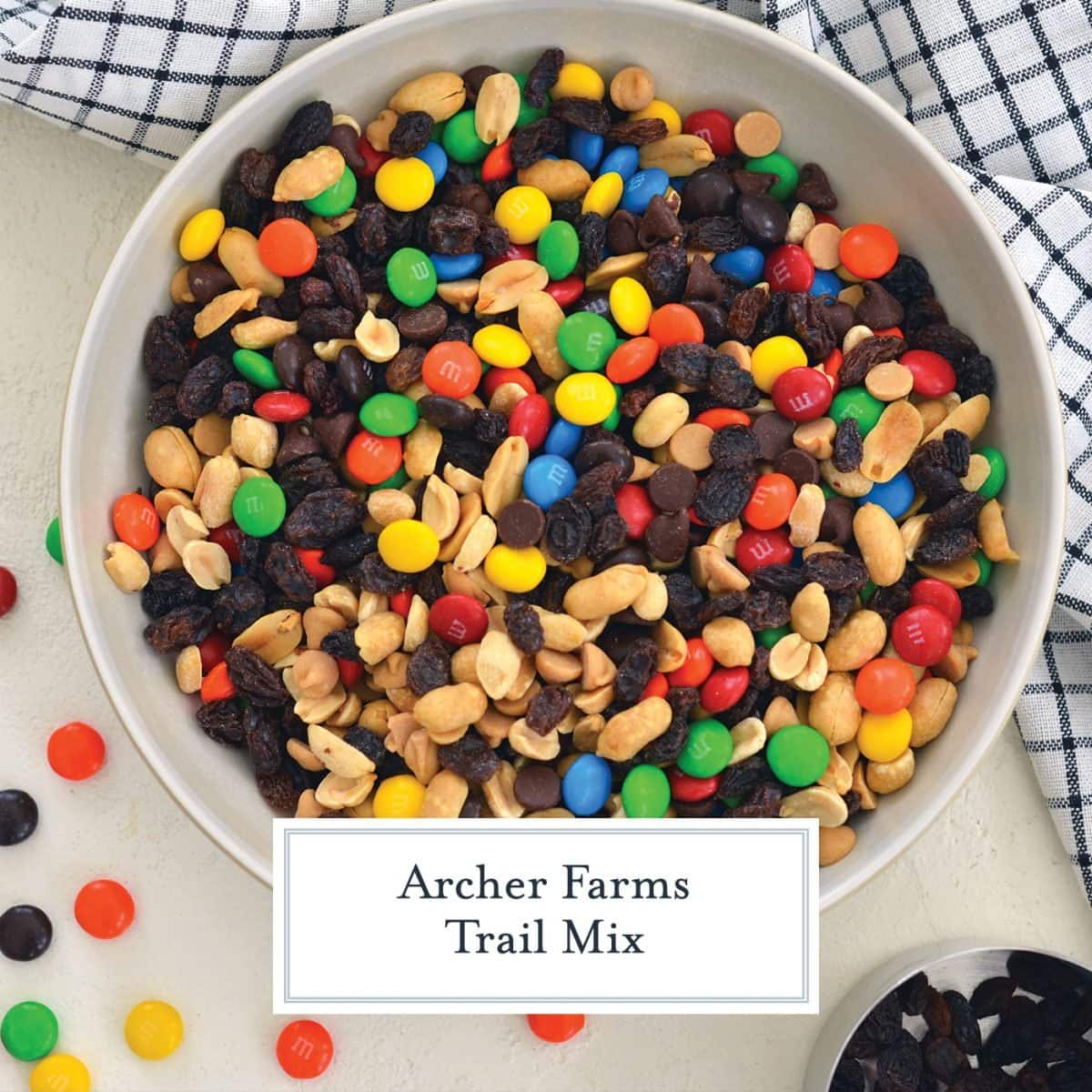 overhead close up of white bowl with monster trail mix