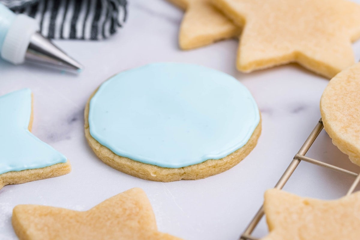 royal icing on a circle sugar cookie