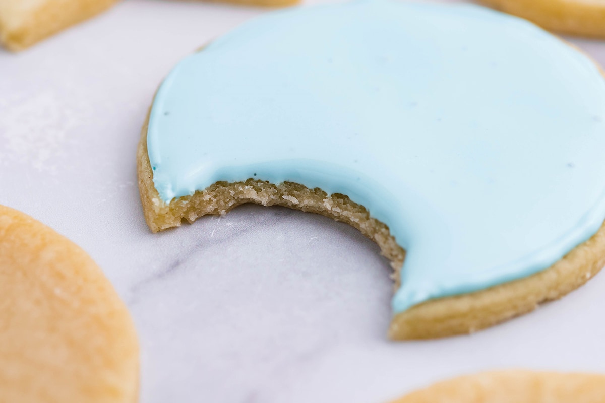 bite out of a blue sugar cookie