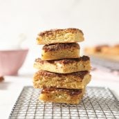 stack of snickerdoodle bars on a cooling rack
