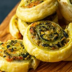 close up of spinach puff pastry pinwheels