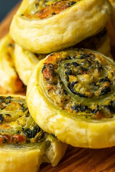 close up of spinach puff pastry pinwheels