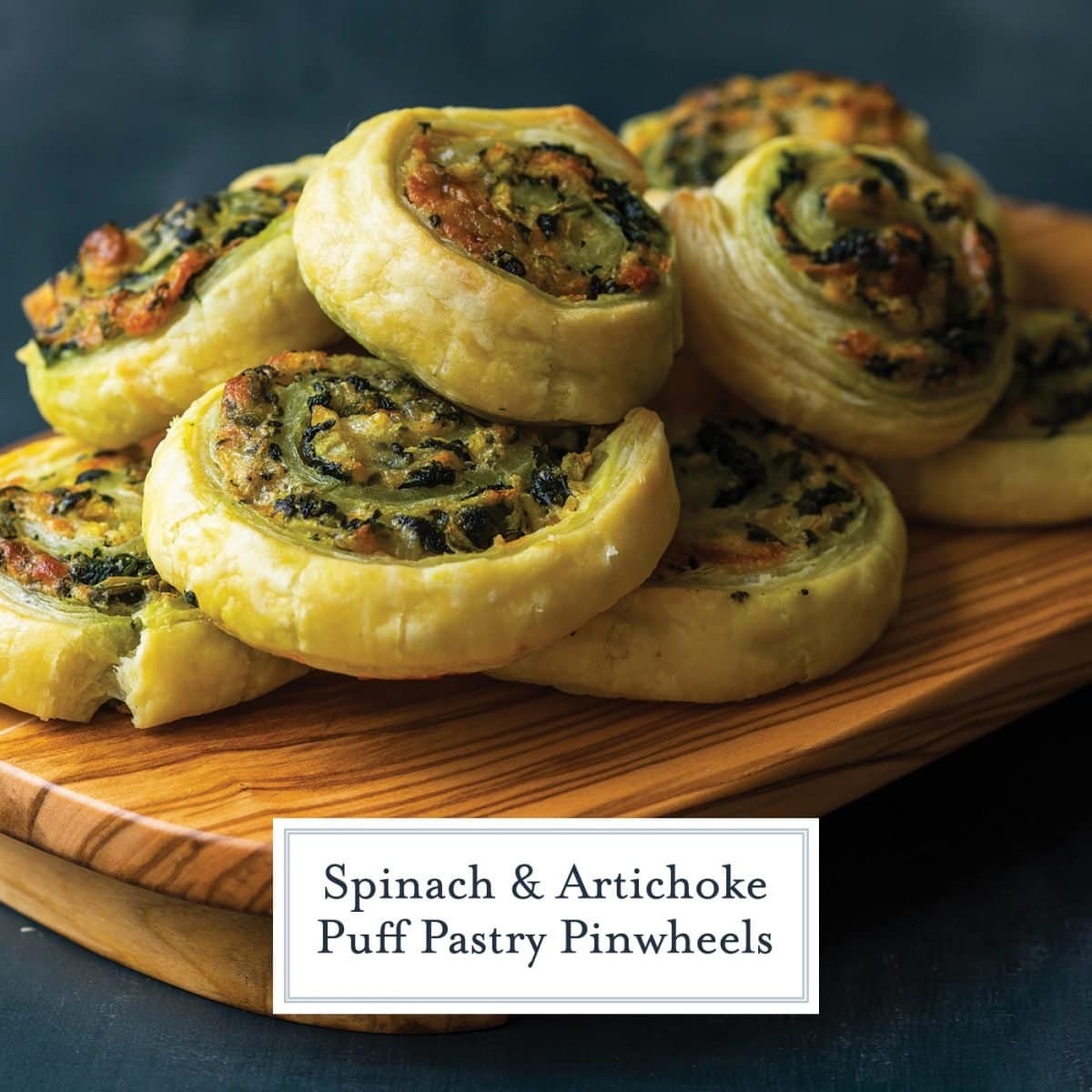pile of cheesy spinach puff pastry pinwheels 