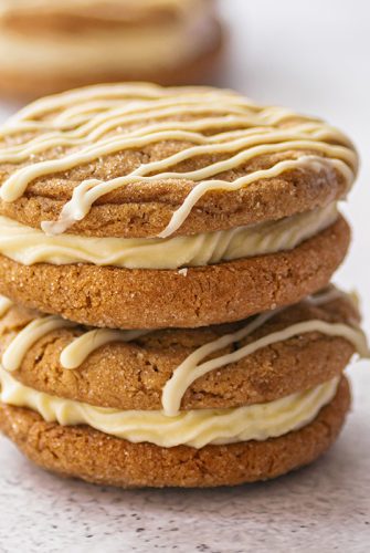 close up of molasses cookie sandwiches stacked