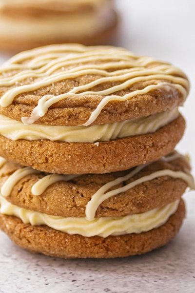 close up of molasses cookie sandwiches stacked