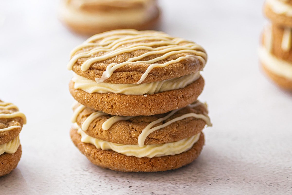 close up of molasses cookie sandwiches stacked