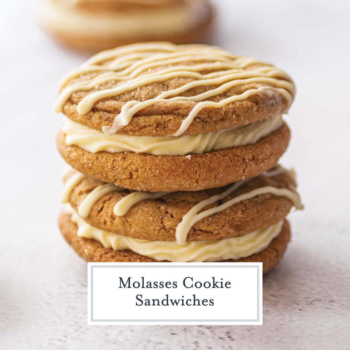 close up stack of molasses cookie sandwiches 