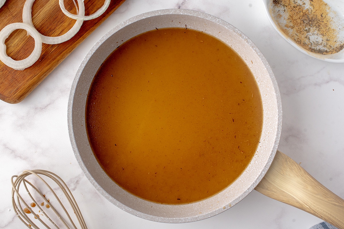 onion gravy in a pan 